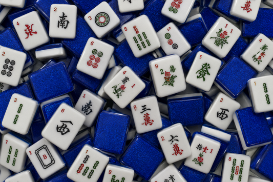 Mahjong tile set with bamboo circle and character symbols - classic Chinese board game