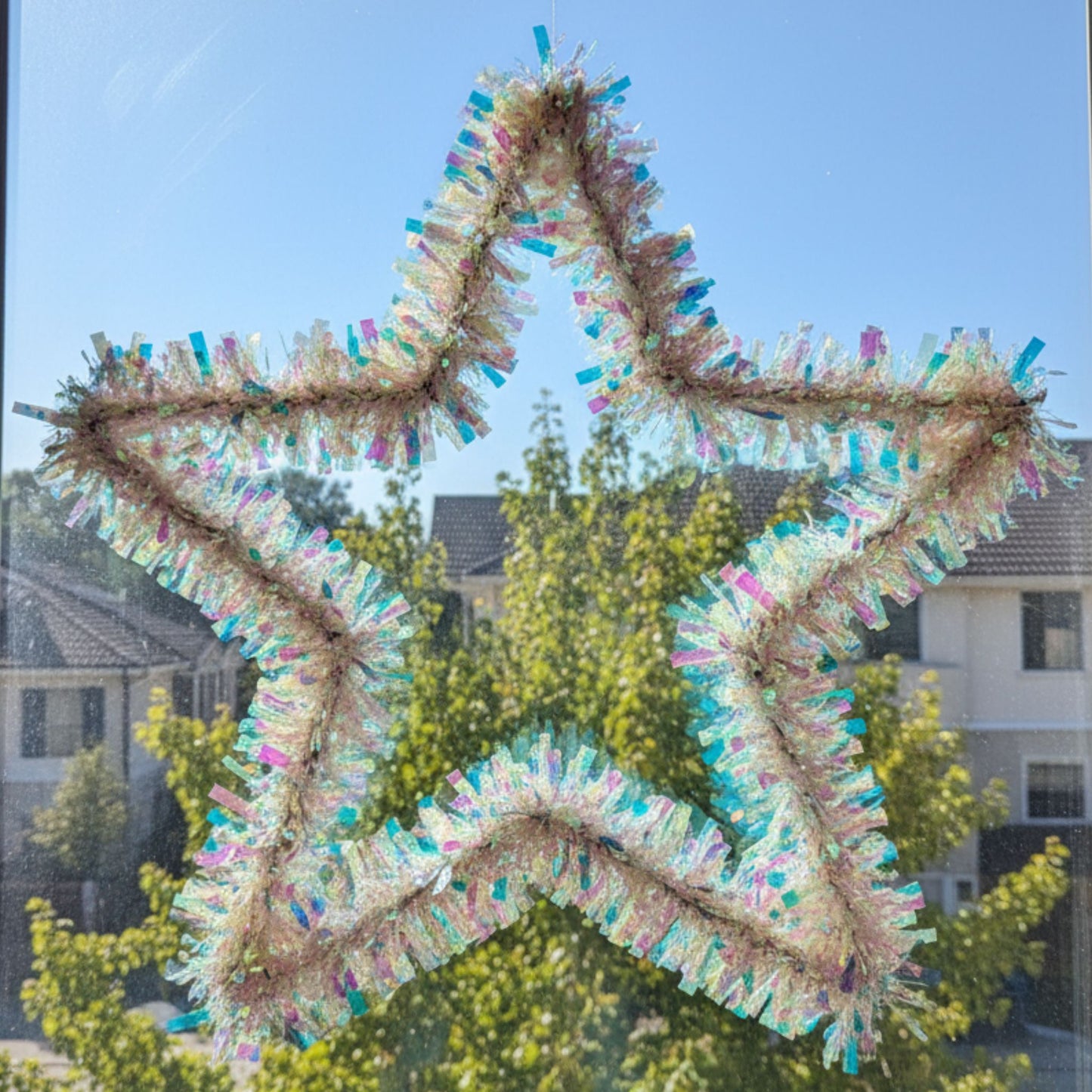 Iridiscent Star Shaped Wreath 24"