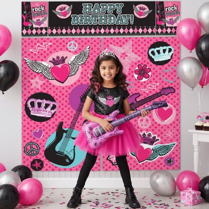 Girl at rockstar princess birthday party with scene setter decoration