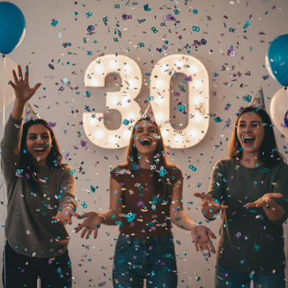 Colorful 30th birthday confetti mix being thrown in air at milestone birthday party
