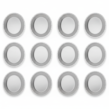 Flat lay of 8 silver shimmering oval platter plates on white background